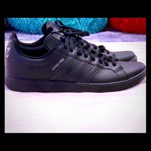 Adidas “Grand Prix” sneakers.